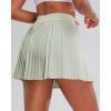 imageRUNNING GIRL Womens Pleated Tennis Skirts with Pockets High Waisted Tummy Control Casual Athletic Workout Golf SkortsPistachio Green